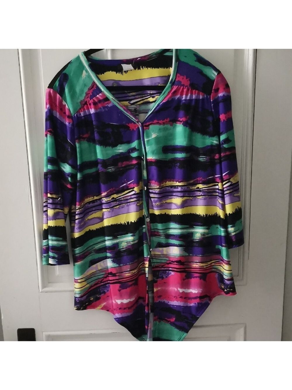 Artsy women's button down blouse with tie. 3/4 sleeves with roll up tabs. Size M